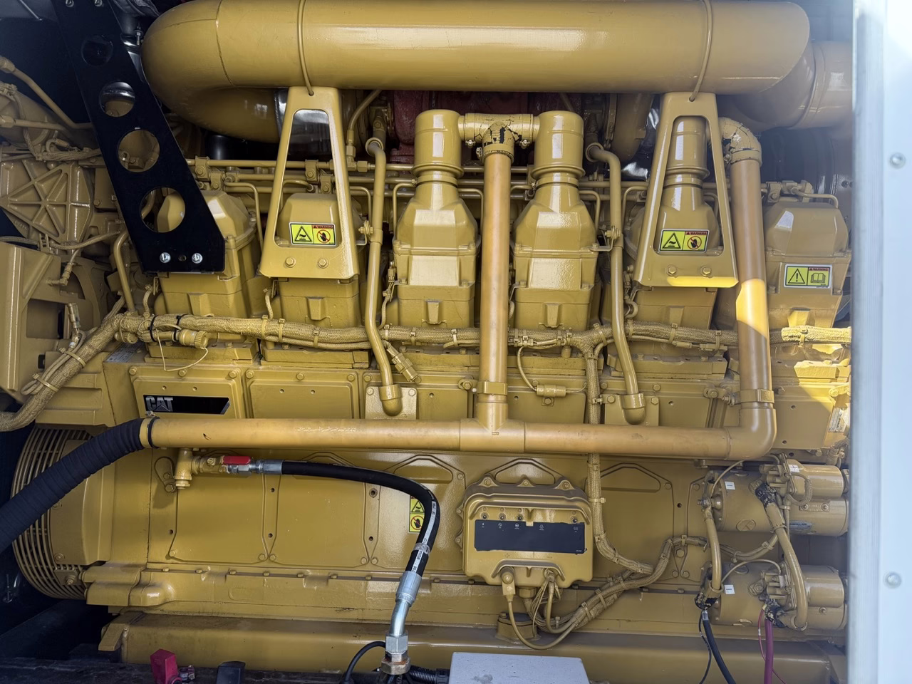 1500 kW CAT 3512C Generator Enclosure interior side view of generator