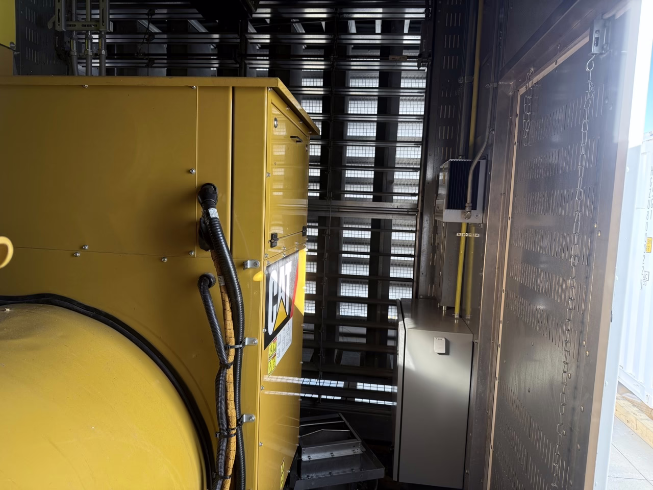 1500 kW CAT 3512C Generator Enclosure light coming through fans