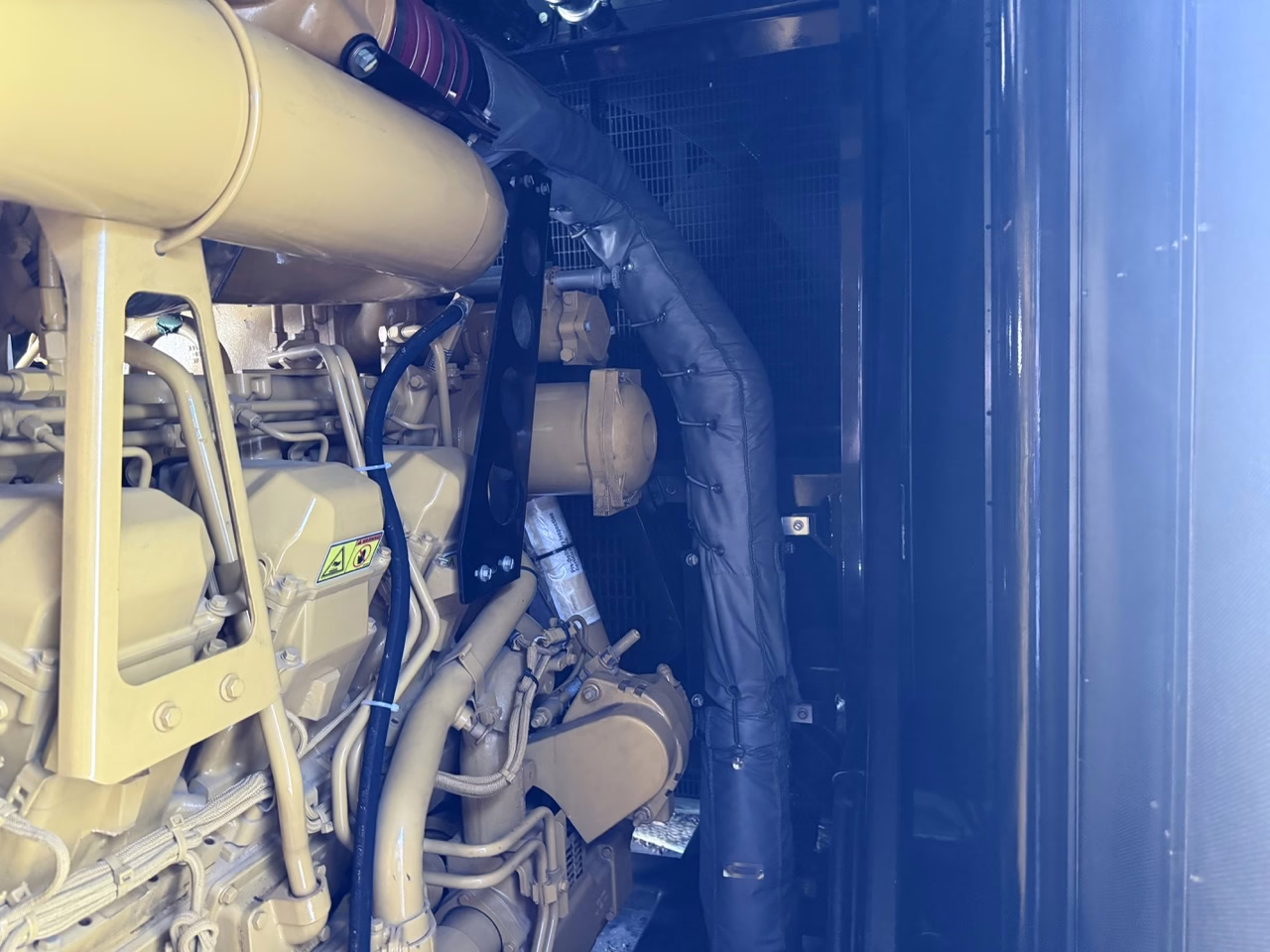 1500 kW CAT 3512C Generator Enclosure pipes on generator