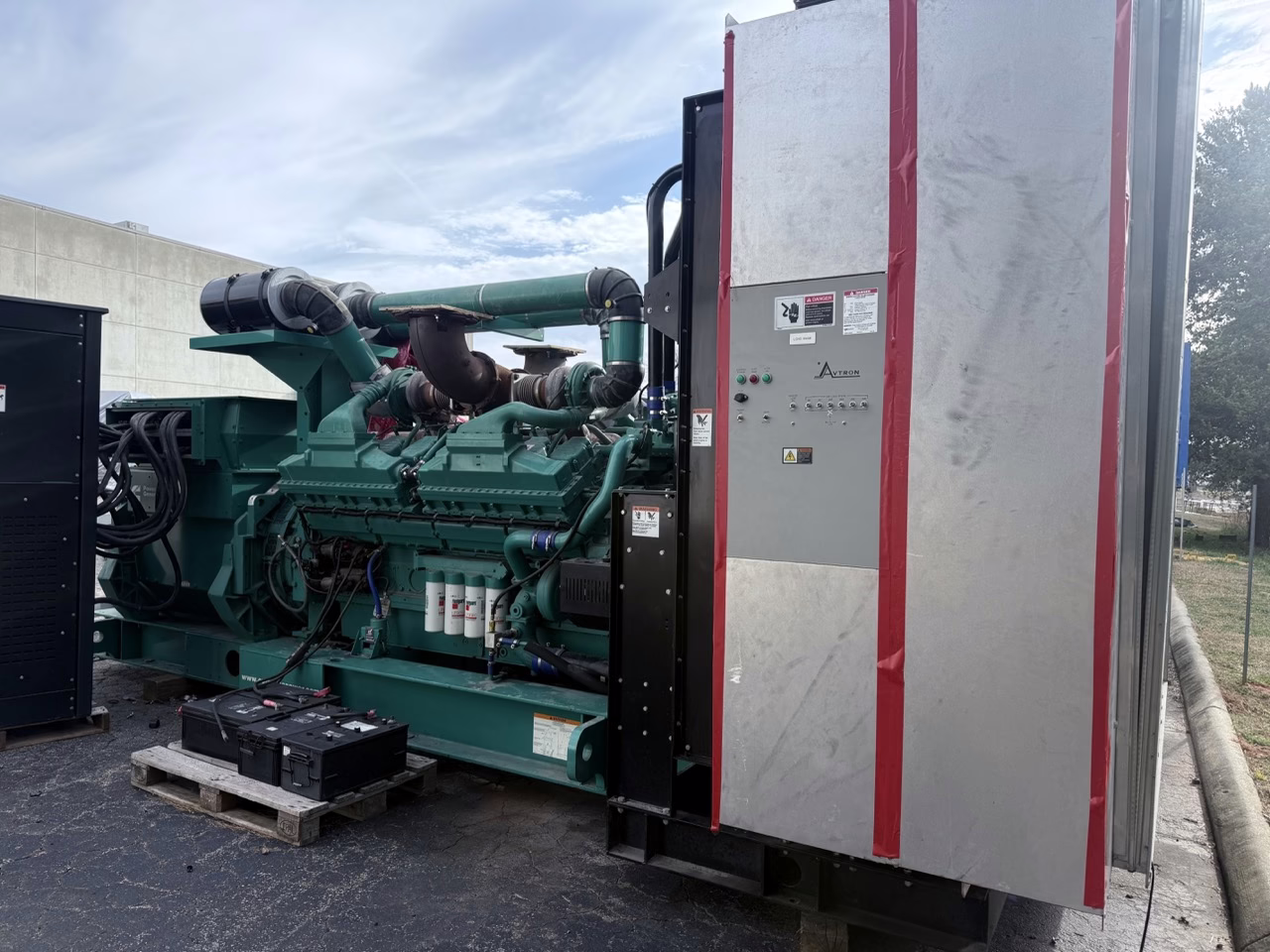 2250 kW Cummins Open Skid Diesel Generator side of fan with generator and data slate